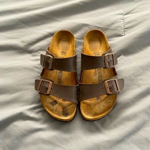 Brown Birkenstocks.